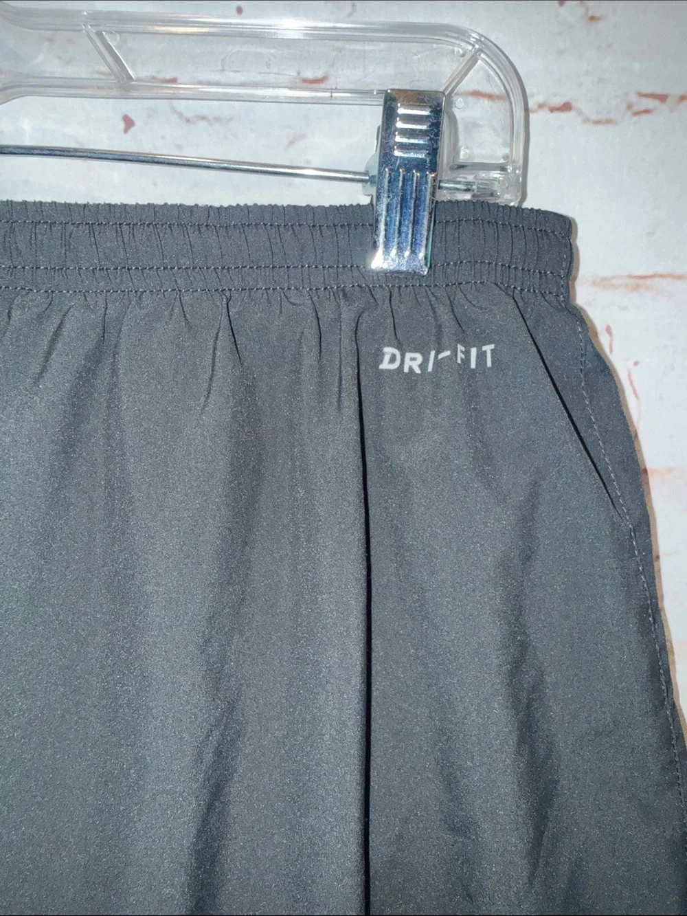Nike Men's Gray Athletic Shorts Black Side Panels White Swoosh Dri fit pockets